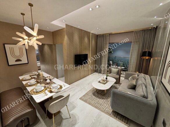 A spacious and elegantly designed living room in Chandak Greenairy, Borivali East, featuring modern interiors, premium flooring, and ample natural light