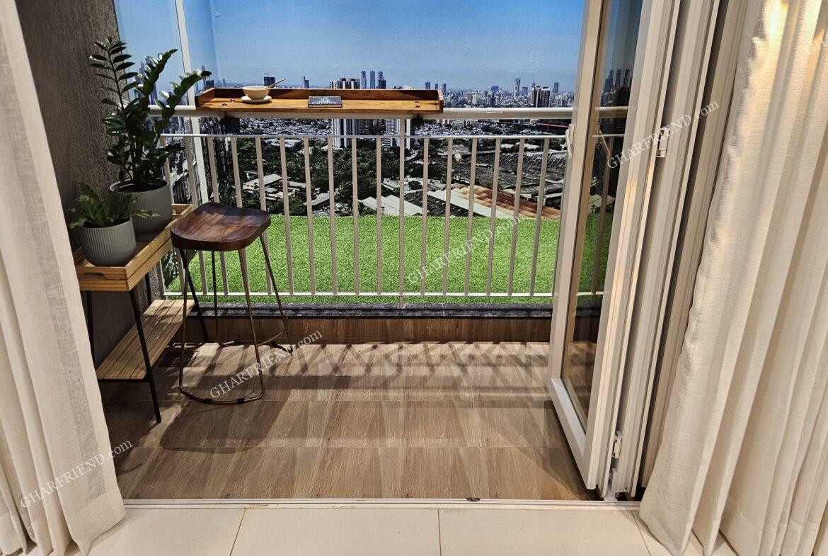 Spacious balcony at Mahindra Vista, Kandivali East, offering stunning city views and a perfect space for relaxation.