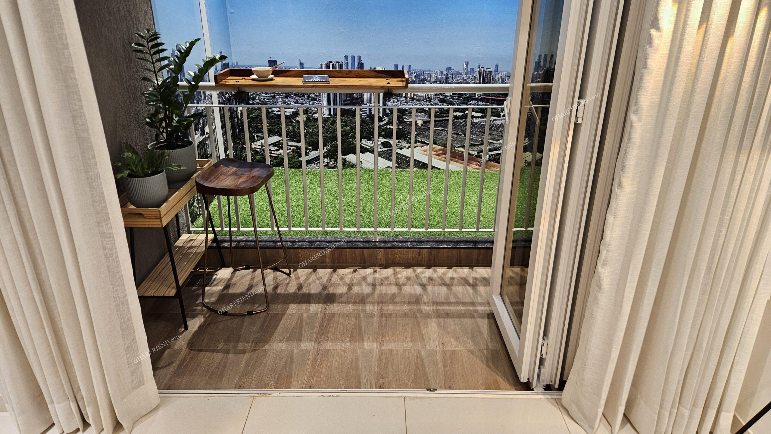 Spacious balcony at Mahindra Vista, Kandivali East, offering stunning city views and a perfect space for relaxation.