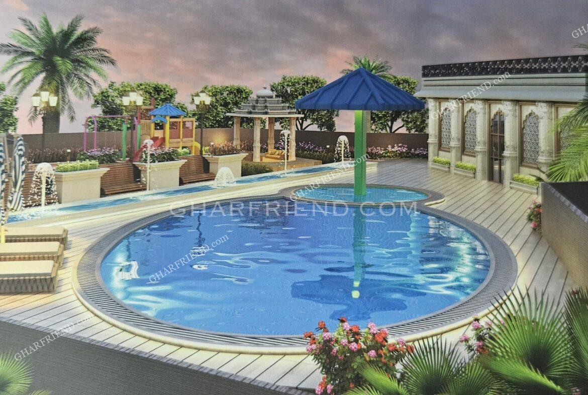 Luxurious swimming pool with crystal-clear water, surrounded by lounge chairs and lush greenery for a relaxing experience.