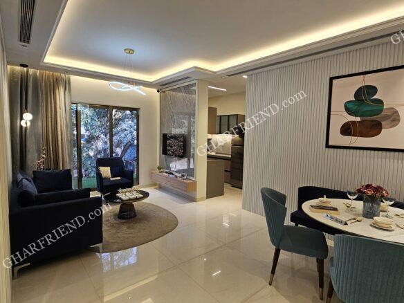 Spacious and elegantly designed living room at Shree Ram Krishna Garden, featuring modern interiors, ample natural light, and a comfortable ambiance.