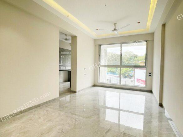 A spacious and elegantly designed living room with modern interiors, ample natural light, and premium finishes in 127 Raj Homes, Mira Road East.