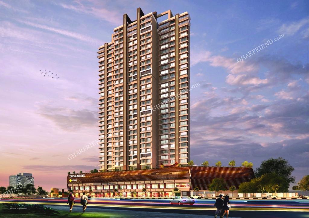 Tall residential tower of Indraneel by Sonam Group in Mira Road, featuring a commercial plaza at the base, captured during twilight with a vibrant sky.