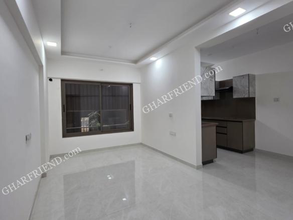 “Modern Living Room in 2 BHK Apartment at Rang Rekha, Dahisar East – Spacious and Well-Lit Interiors”